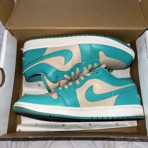 Woman’s Teal Air Jordan 1 lows